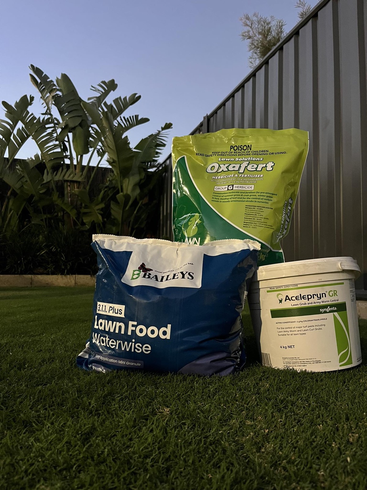 Bailey’s lawn food, Oxafert and Acelepryn turf products on a healthy green lawn